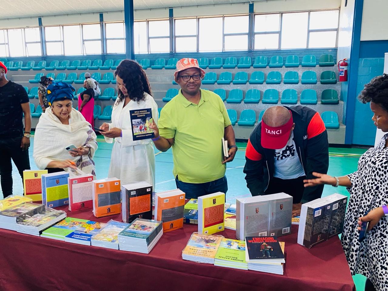 Tanci Publishers book display at a community event